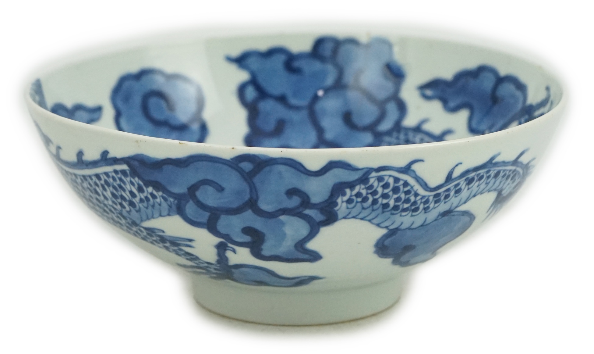 A Chinese blue and white ‘cloud and dragon’ bowl, Yongzheng mark and period (1723-35)